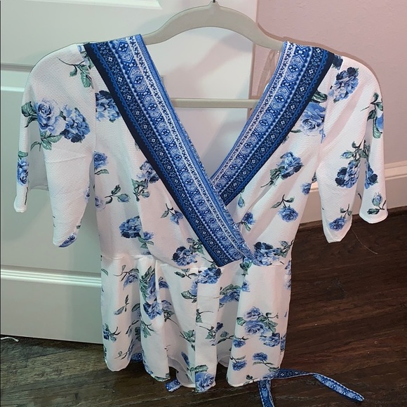 Blue and white flowered romper— tag is still on! - Picture 1 of 2